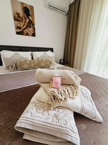 Katil atau katil-katil dalam bilik di Sol Greco Apartment