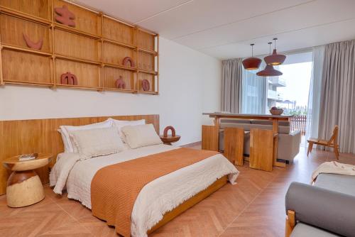 Postel nebo postele na pokoji v ubytování WhiteLace Resort