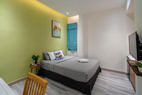 Кровать или кровати в номере B-HOMEAWAY LUXURY Apartment - Ben Thanh Central