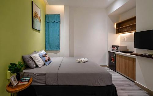 Кровать или кровати в номере B-HOMEAWAY LUXURY Apartment - Ben Thanh Central