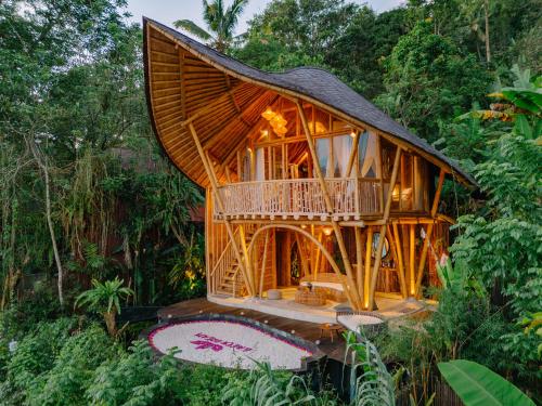 a tree house in the middle of the forest at Jiva Bali - Green Dream Suites in Selat