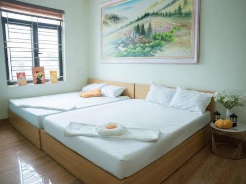 Postel nebo postele na pokoji v ubytování nhà nghỉ Ngân Hà