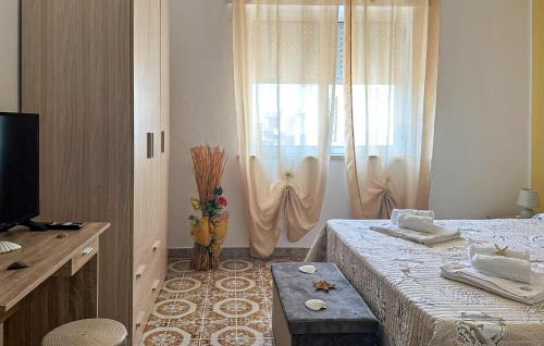 Ένα ή περισσότερα κρεβάτια σε δωμάτιο στο 2 Bedroom Beautiful Home In Torrenova