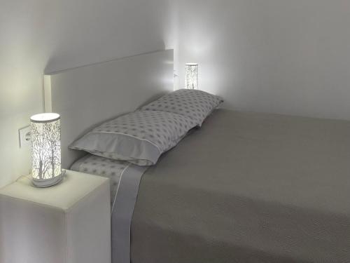 Postel nebo postele na pokoji v ubytování Casinha da Bia - Gerês