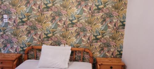 Кровать или кровати в номере Hotel Matina