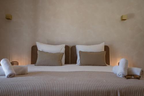 a bedroom with two beds with stuffed animals on them at Hotel Galfi - Boutique & Adults Only in San Antonio