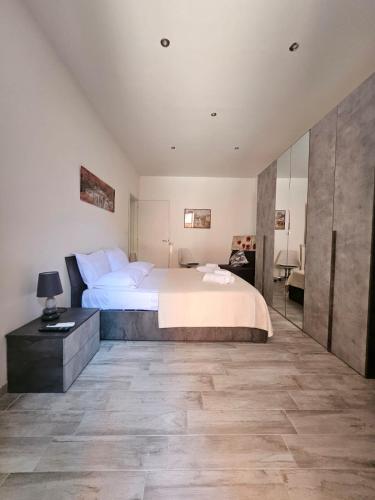 Ένα ή περισσότερα κρεβάτια σε δωμάτιο στο San Lorenzo Garden Suites
