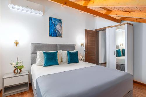 Postel nebo postele na pokoji v ubytování Adriatic Residence