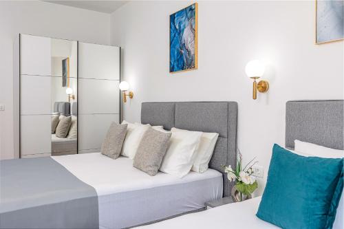 Postel nebo postele na pokoji v ubytování Adriatic Residence