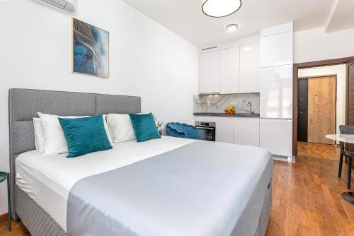 Postel nebo postele na pokoji v ubytování Adriatic Residence