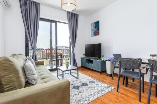 TV a/nebo společenská místnost v ubytování Adriatic Residence