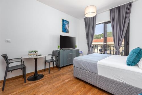 Postel nebo postele na pokoji v ubytování Adriatic Residence
