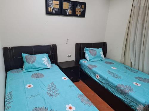 Giường trong phòng chung tại Porto marina Alamein North Coast marina