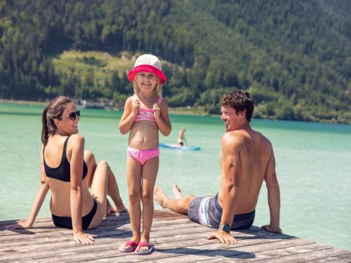 a group of people on a dock in the water at Apartment at the Achensee in Achensee