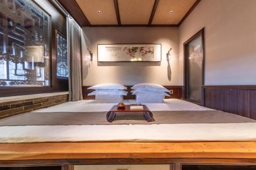 Tao Hotelにあるベッド
