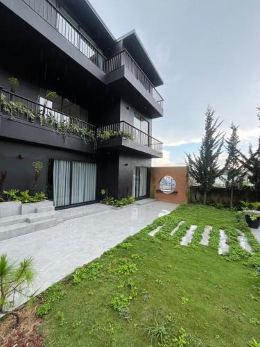 Taman di luar Ben Ben - Casa De iluso