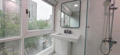 Koupelna v ubytování 喜園旅館Ximen Garden Inn