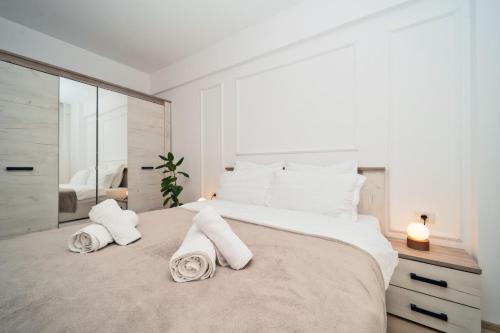 Katil atau katil-katil dalam bilik di Modern Apartment with Free Private Parking in Timisoara