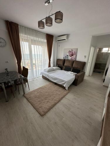 Llit o llits en una habitació de Andi Residence