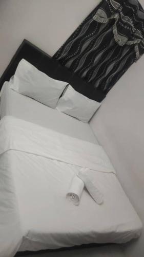 Кровать или кровати в номере Dynamic smartstay