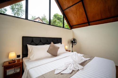 Payang Cabin Kintamaniにあるベッド