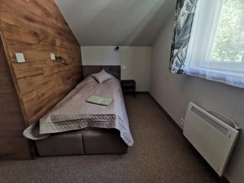 Postel nebo postele na pokoji v ubytování Pod gwiazdami