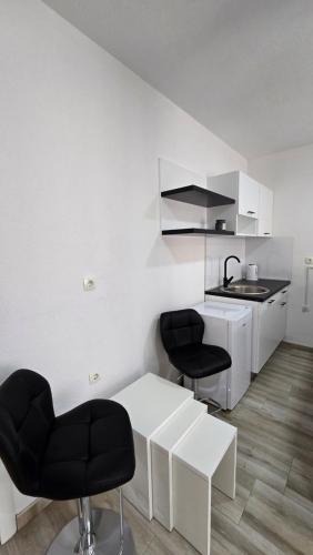 Kuchyň nebo kuchyňský kout v ubytování Champion APARTMAN Potoci M17