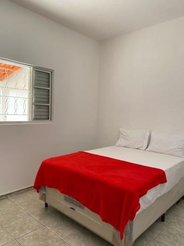 Postel nebo postele na pokoji v ubytování Casa Jabuticabeira