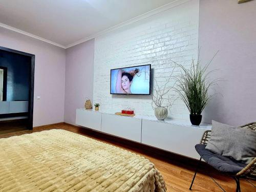 Телевизор и/или развлекательный центр в 25 Best apartment in the center city