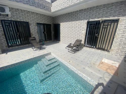 Piscina a Résidence Codou Bigué o a prop