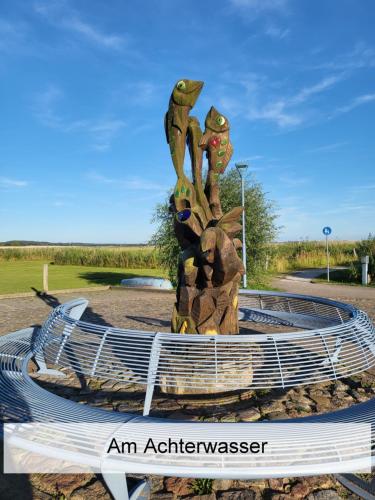 a statue of an amphitheater in a park at Ostsee-Urlaub-Zempin direkt am Küstenwald, nur wenige Minuten zum Strand, optimal für Paare mit 1 Hund bis 45 cm Schulterhöhe in Zempin