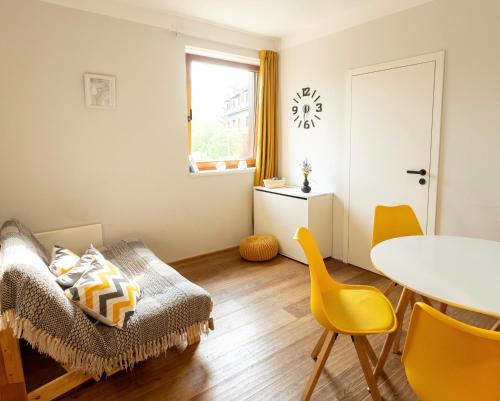 Posezení v ubytování Útulný apartmán v srdci Krkonoš se saunou
