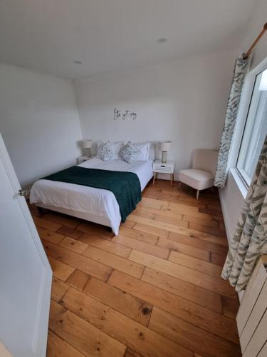 Postel nebo postele na pokoji v ubytování Vimy House