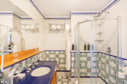 a bathroom with a sink and a shower at Manzi Hotel & Spa in Ischia