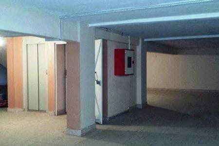 an empty hallway with a red door in a building at Lilia-appart Luxe et confort in Oujda