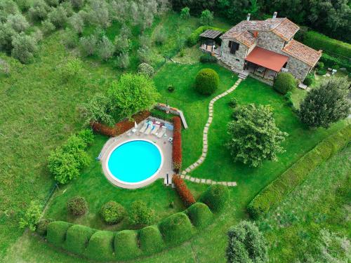 an aerial view of a estate with a swimming pool at Villa Toscana in Montecastelli Pisano