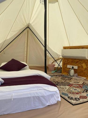 Postel nebo postele na pokoji v ubytování Perhentian Glamping Dnamie - BS