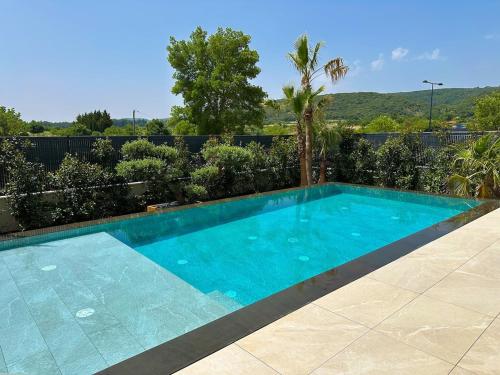 Πισίνα στο ή κοντά στο Magnifique villa contemporaine