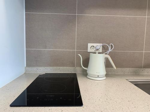 Utensilios para hacer té y café en Blue Terra Sokcho