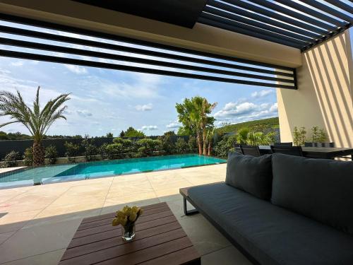 Πισίνα στο ή κοντά στο Magnifique villa contemporaine