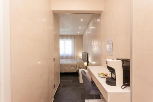 Postel nebo postele na pokoji v ubytování B&B Il Glicine