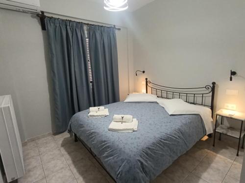 Vasilis Apartmentsにあるベッド