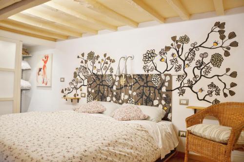 Ένα ή περισσότερα κρεβάτια σε δωμάτιο στο A Casa Di Olga