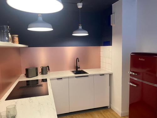 Kuchyň nebo kuchyňský kout v ubytování Karls Apartment B09