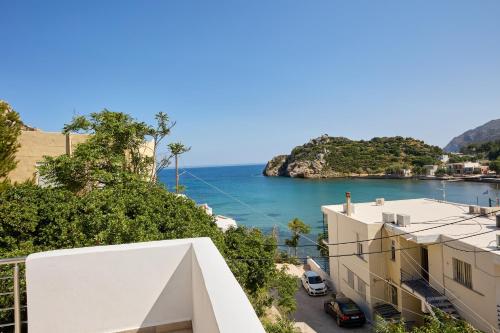 a view of the ocean from a building at Thea Apartment 3 in Emporeios
