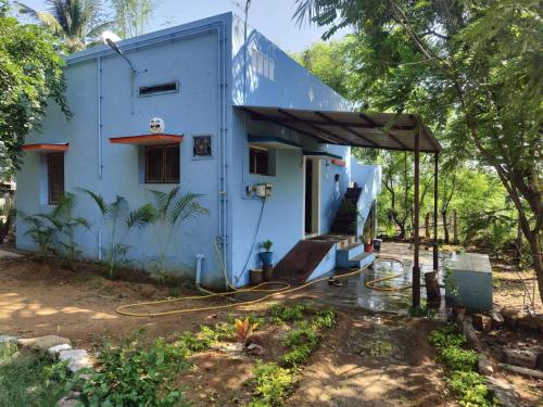 a house being constructed with a house at RICHVINU HOME sTAY in Madurai