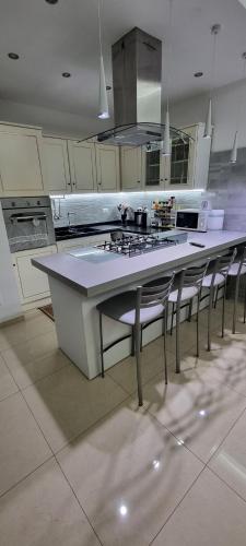 a kitchen with a large island in the middle at Aurora sul mare in Terracina