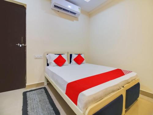 Ένα ή περισσότερα κρεβάτια σε δωμάτιο στο Hotel O Space Inn
