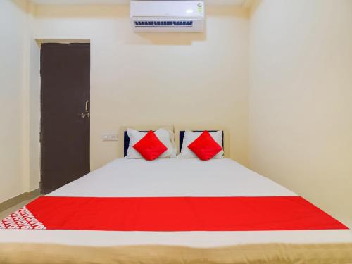 Ένα ή περισσότερα κρεβάτια σε δωμάτιο στο Hotel O Space Inn