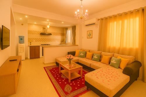 TV a/nebo společenská místnost v ubytování Residence Amira